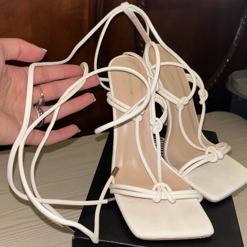 White heels from pretty little things. Wore couple of times but still like new.